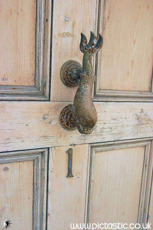 A photograph of an antique door knocker in St Ives Cornwall